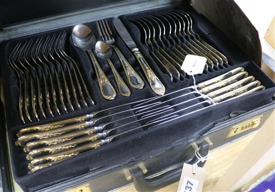 A canteen of Solingen gold-plated cutlery, setting for twelve (case a.f.)